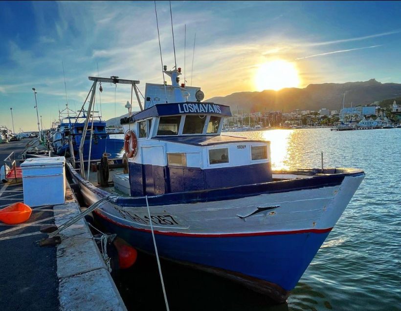 Los Mayans boat docked at the port of La Ràpita. Terres de l'Ebre Museum. ARGO 15. Barcelona Maritime Museum.